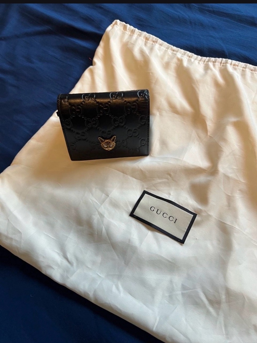 Gucci Black Embossed Leather Wallet with Silver Cat Head Accent